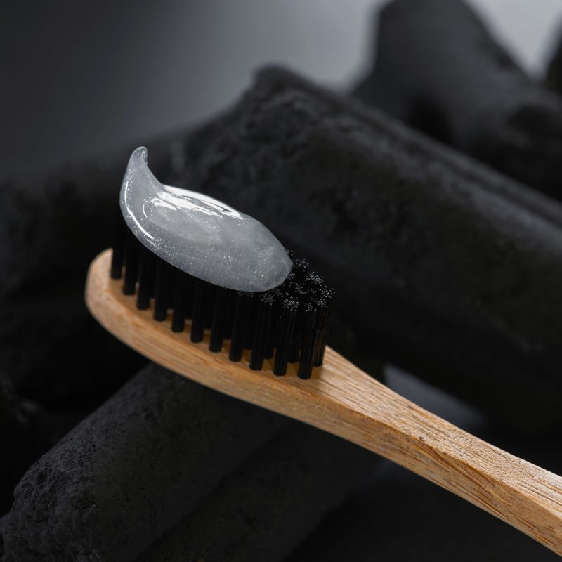 Charcoal toothpaste and bamboo toothbrush