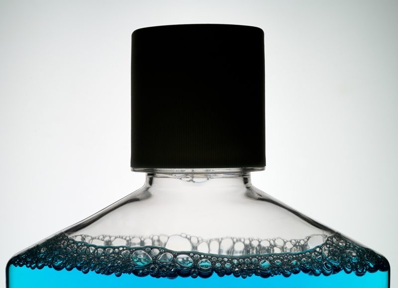 Blue mouth wash liquid in bottle